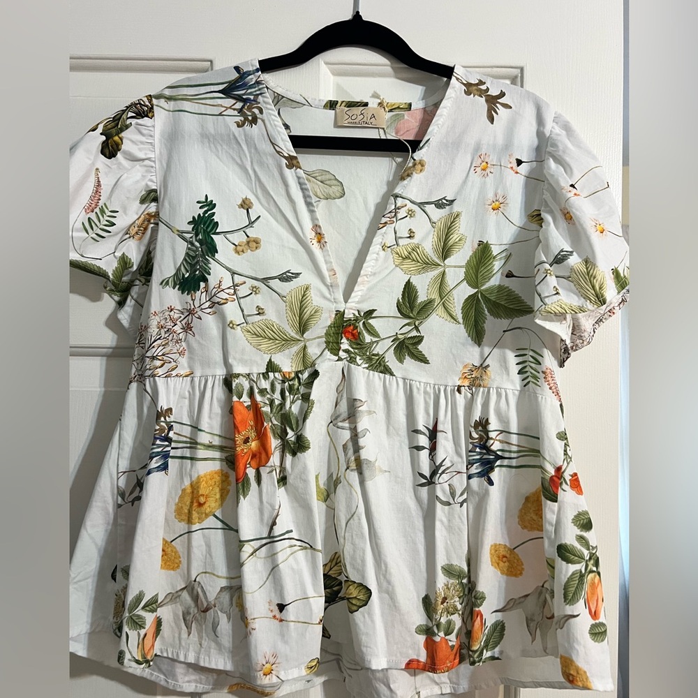 White blouse with floral design